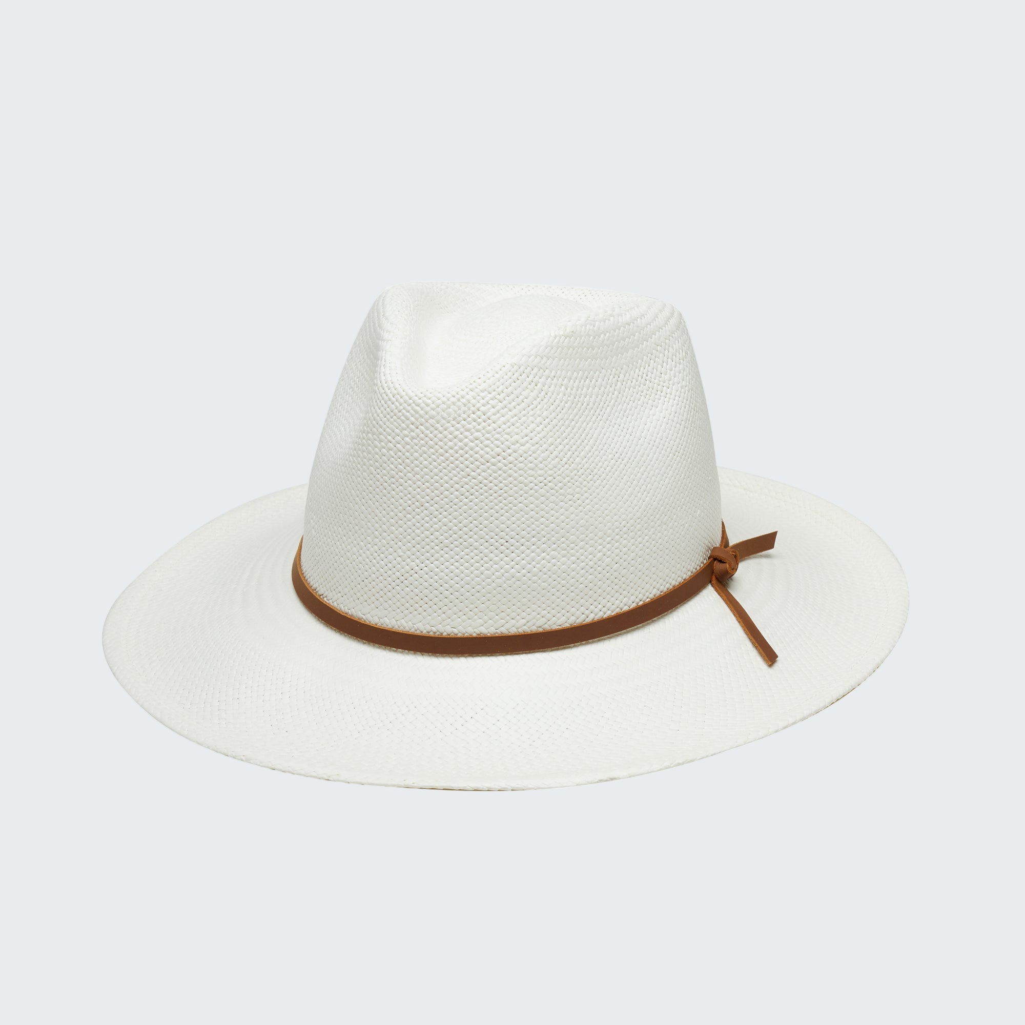 White fedora hat with a brown band on a white background