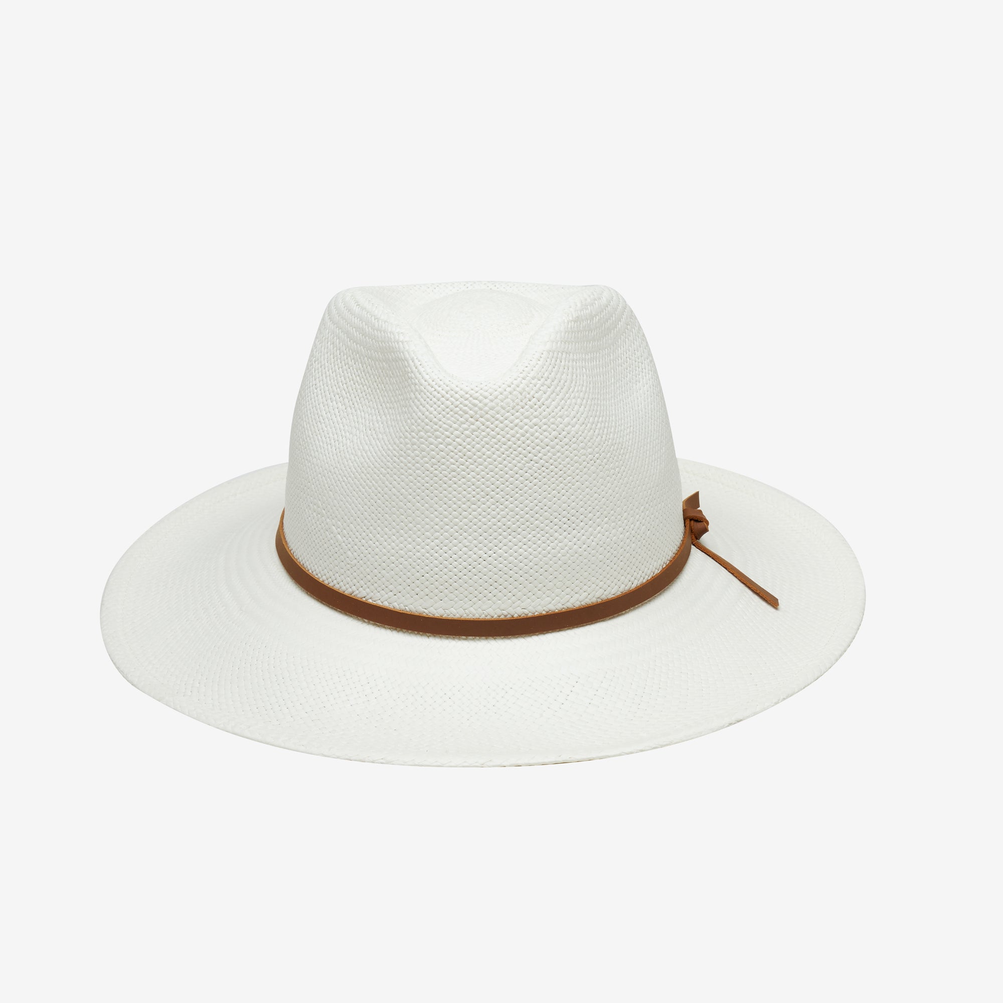 White fedora hat with brown band on a light gray background