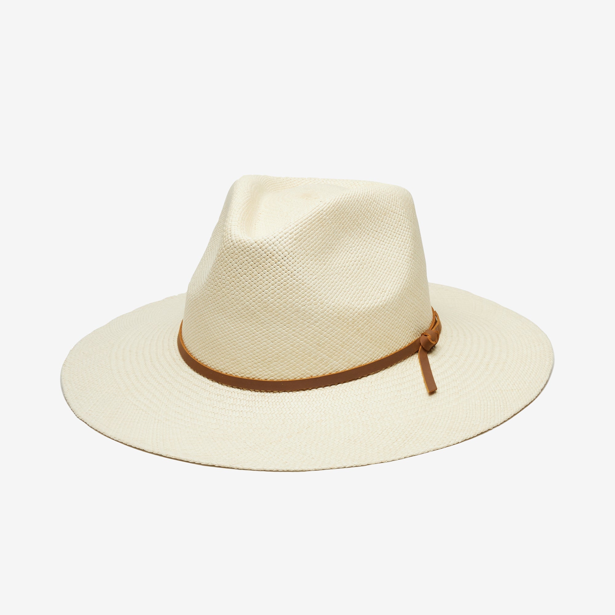 Beige straw hat with brown band on a white background