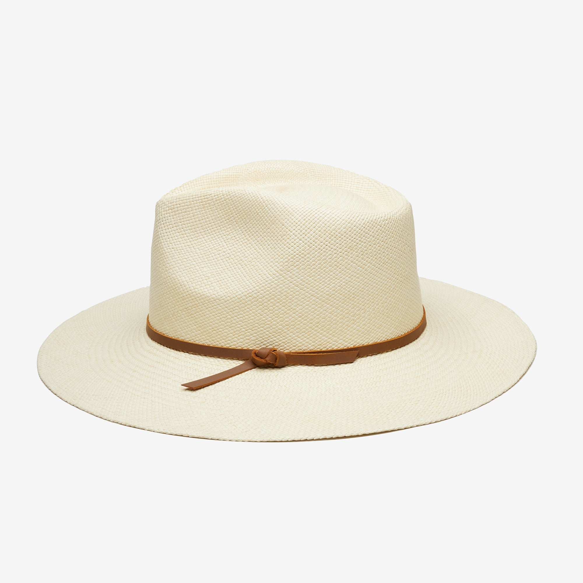Beige straw hat with a brown band on a white background