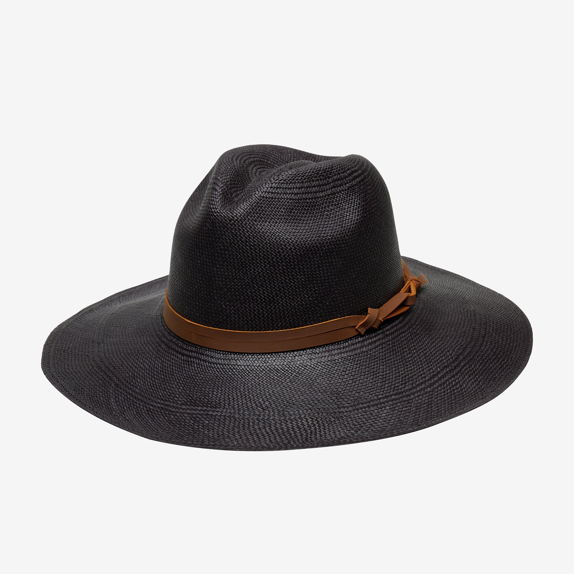 Black straw hat with a brown band on a white background