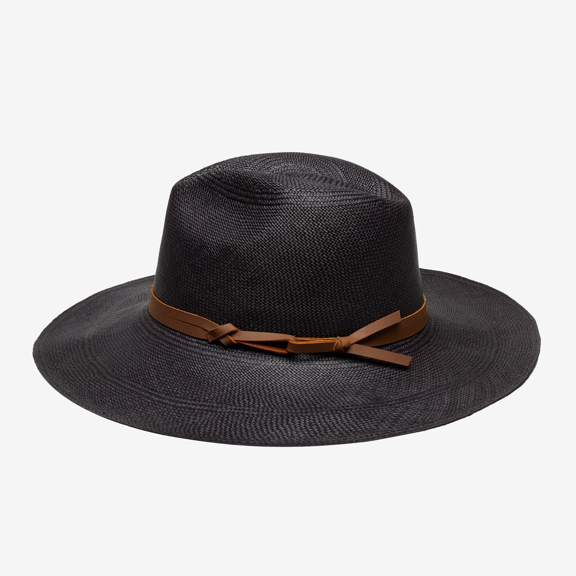 Black straw hat with a brown band on a white background