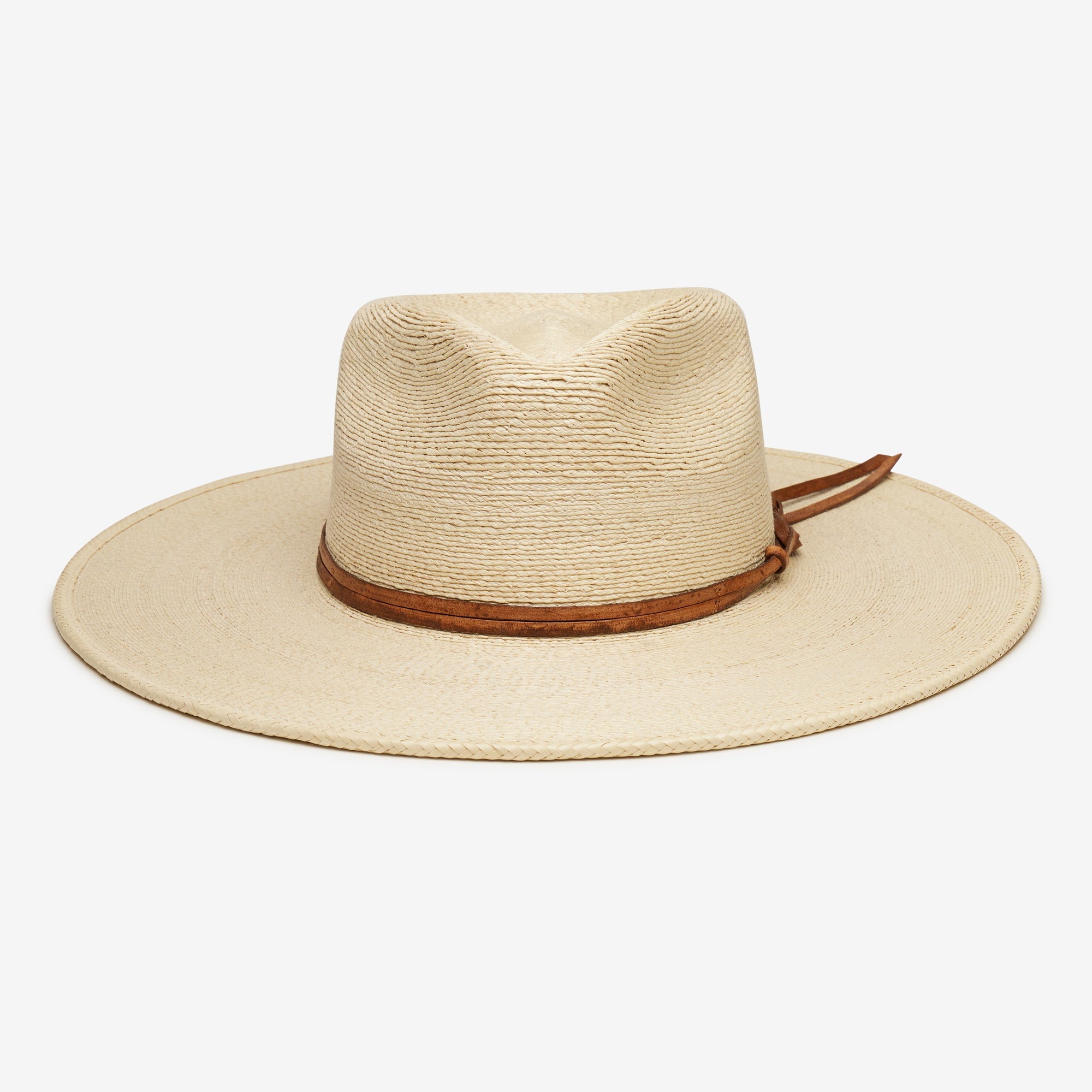 Beige straw hat with brown band on a white background