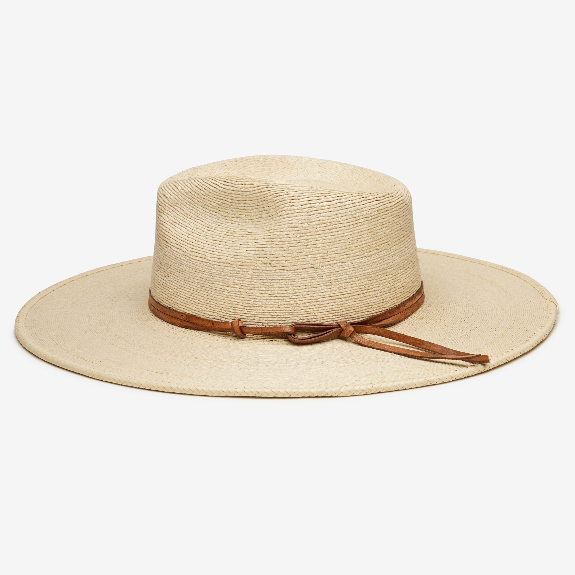 Beige straw hat with a brown band on a white background