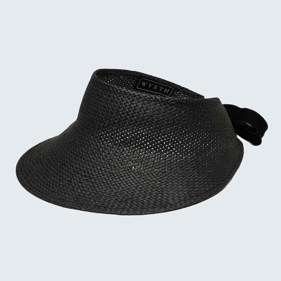 Black woven visor hat with a brand label on a white background