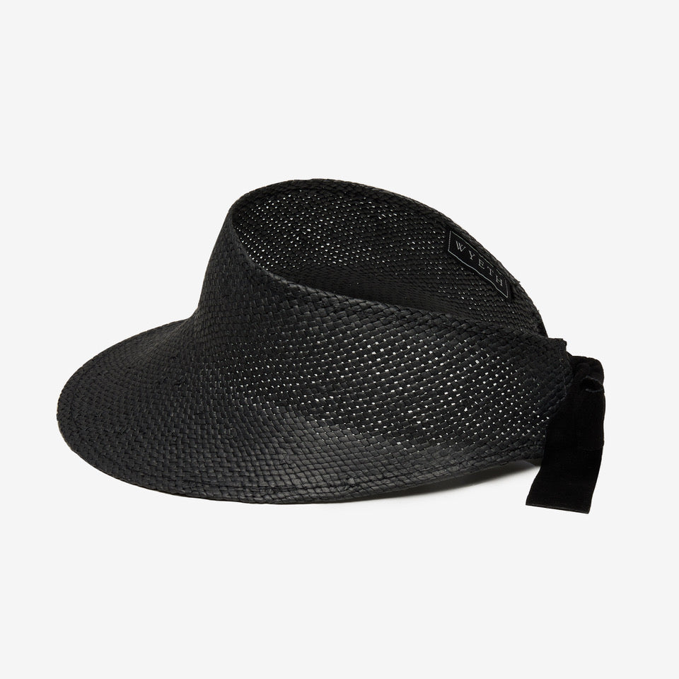 Black straw visor hat with a ribbon on a white background