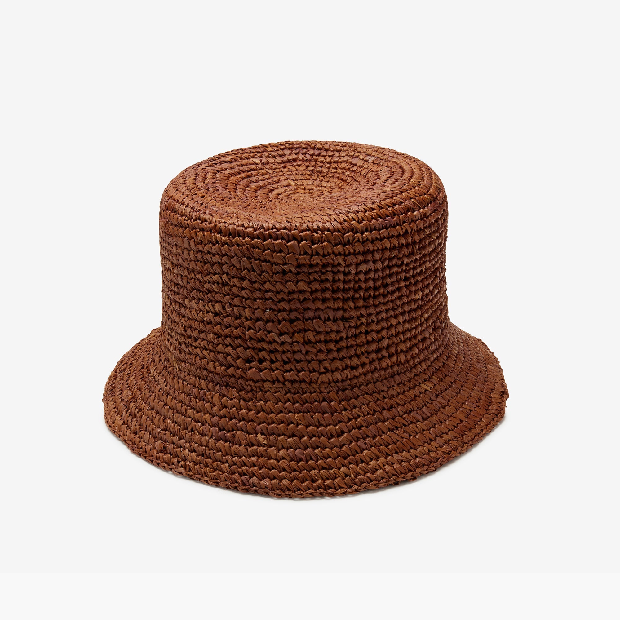 Brown woven bucket hat on a white background