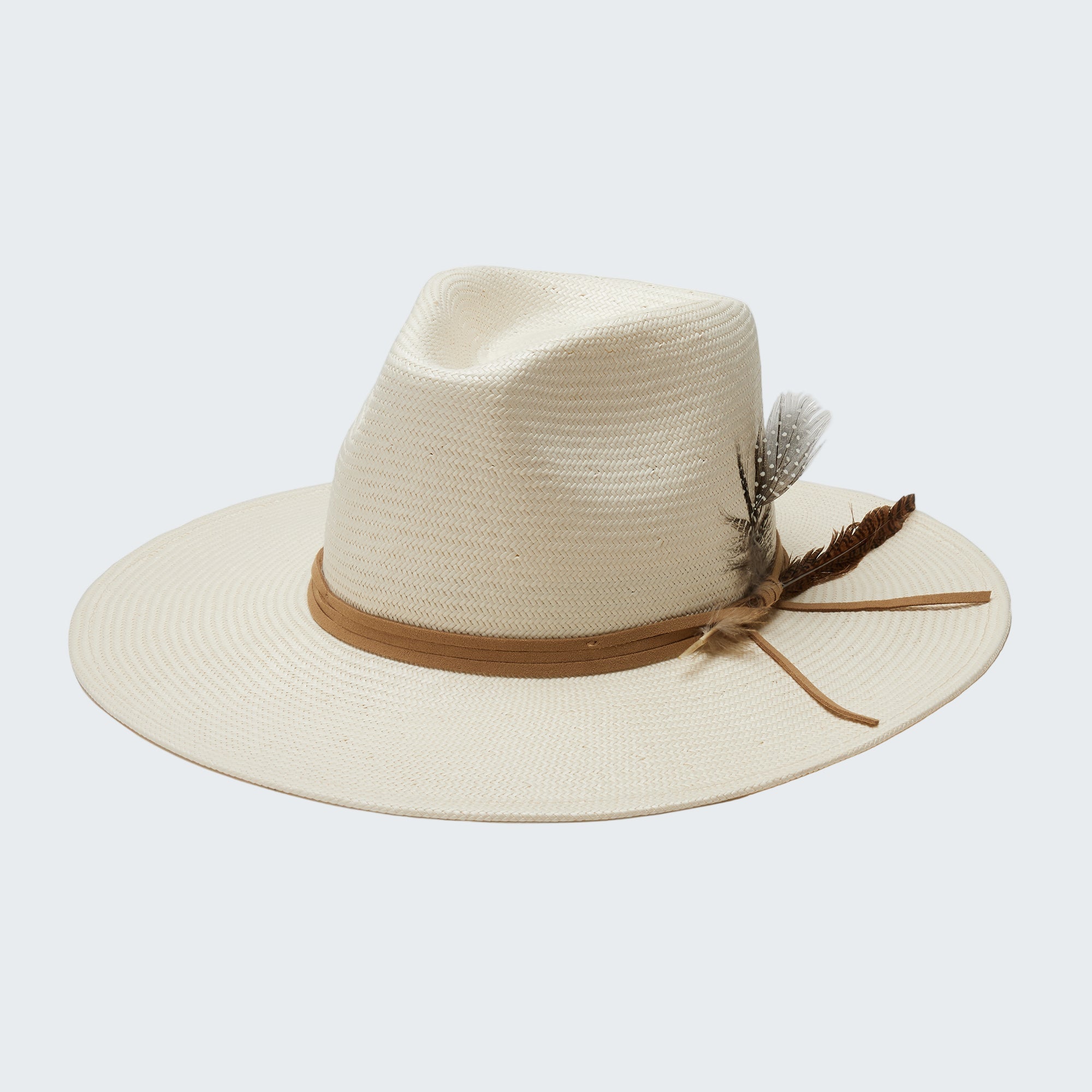 Beige straw hat with a brown band and feather on a white background