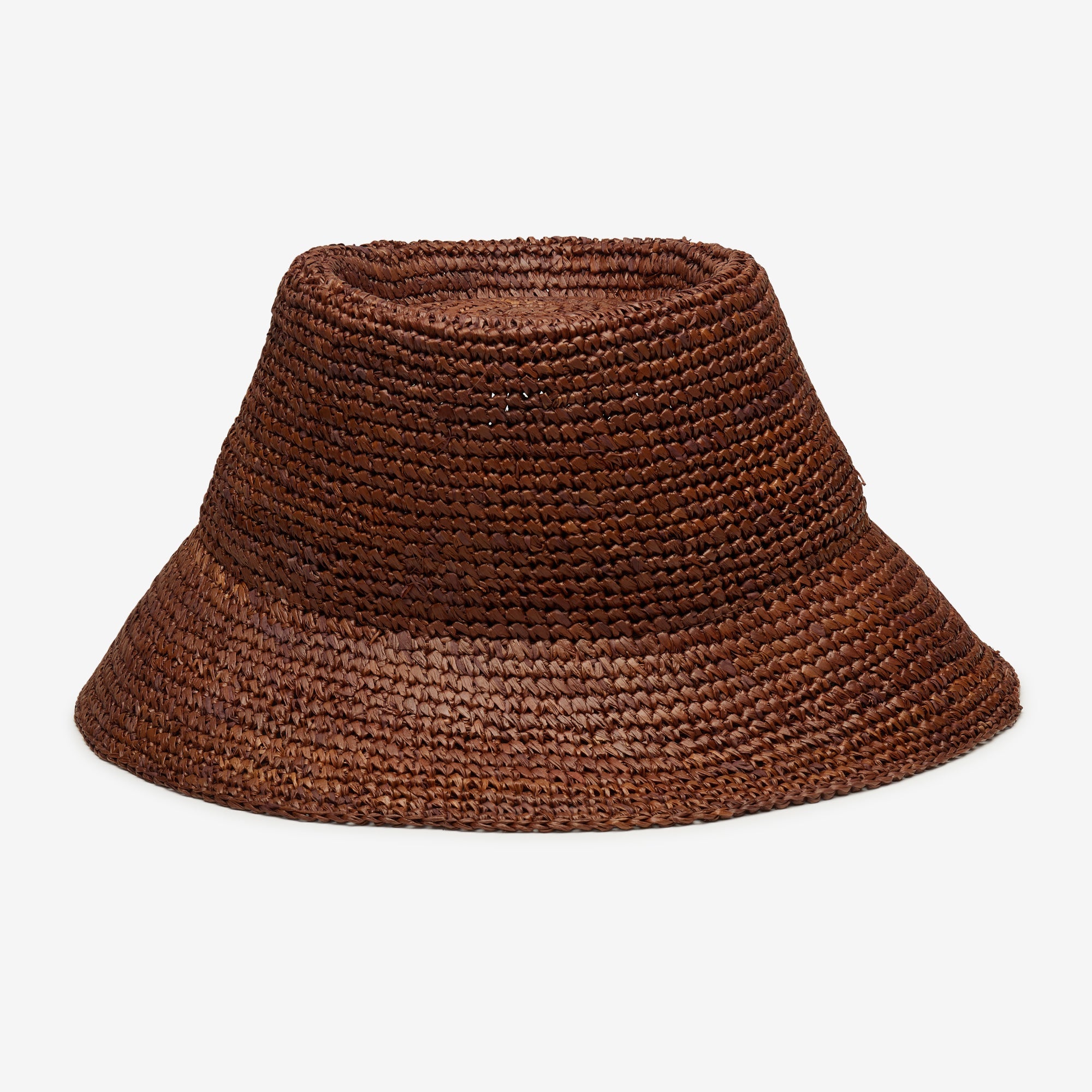 Brown woven bucket hat on a white background