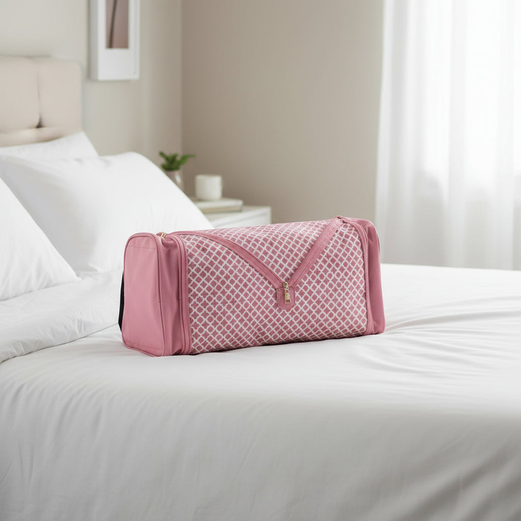 Pink mesh bag with zipper on a white background