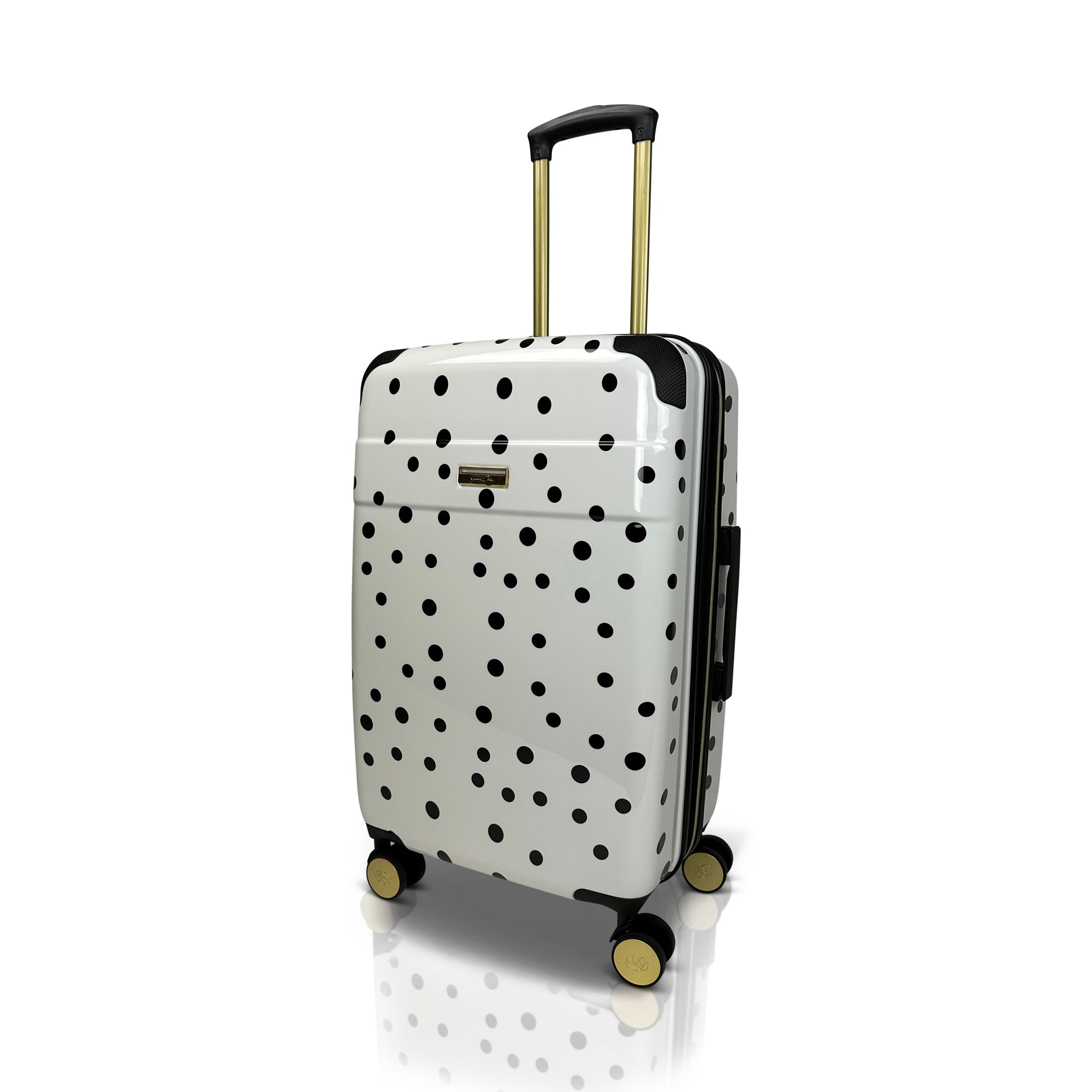 White suitcase with black polka dots on a white background