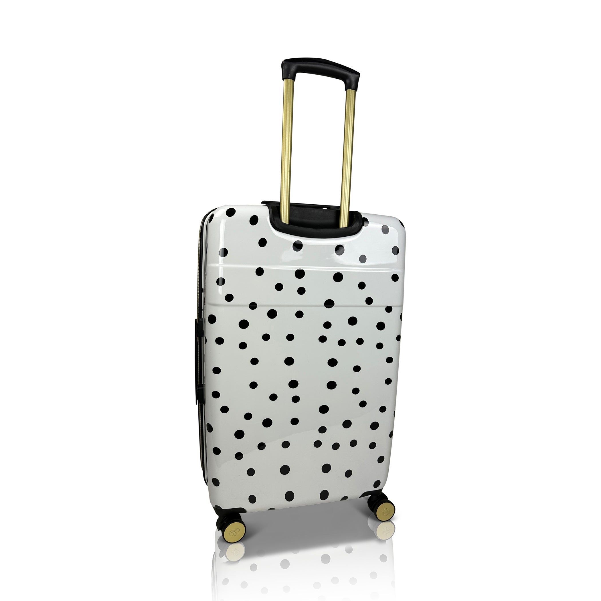 White suitcase with black polka dots on a white background