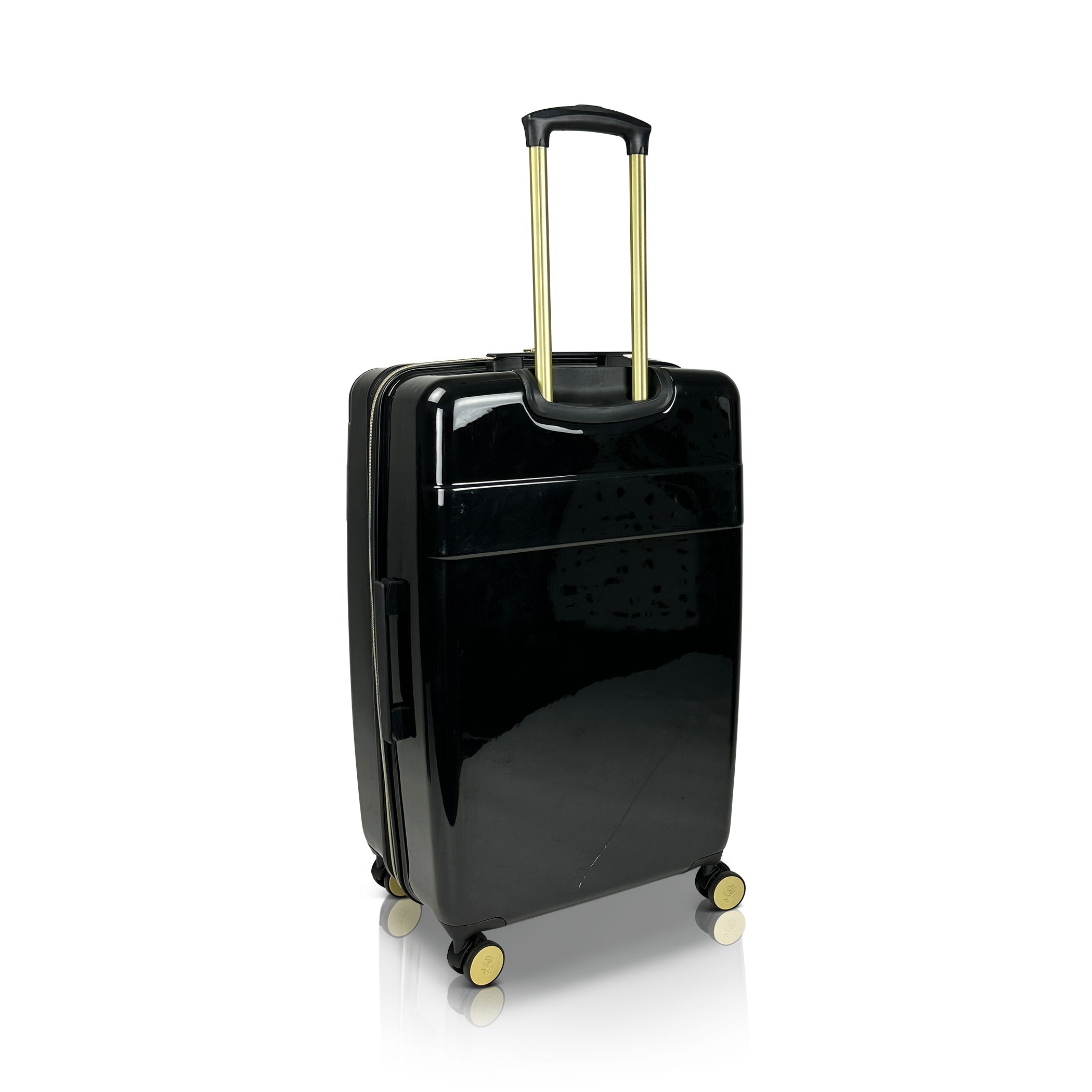 Black suitcase with gold handle and wheels on a white background