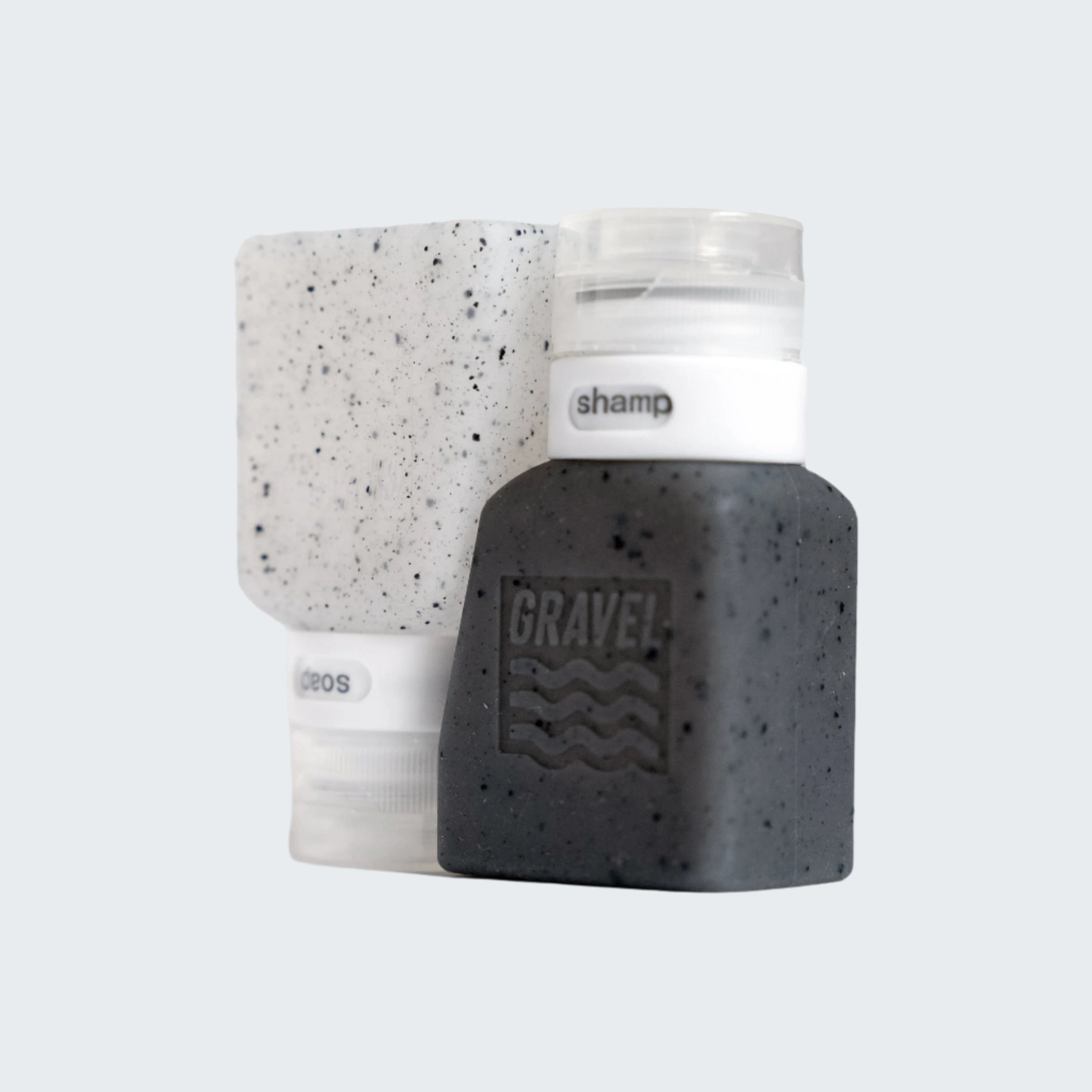 Two bottles with 'Gravel' branding on a white background