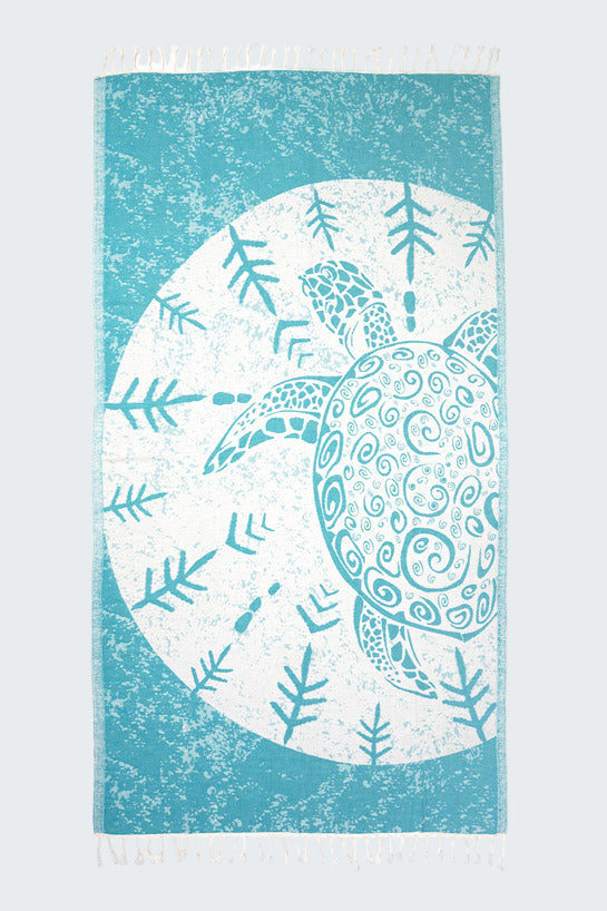 Towel with a turtle design on a blue and white background