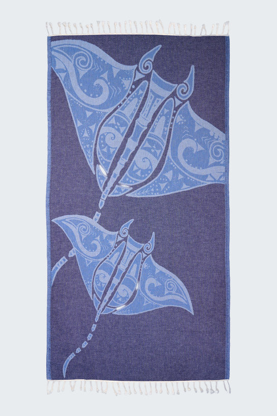 Navy blue towel with blue stingray design on a white background