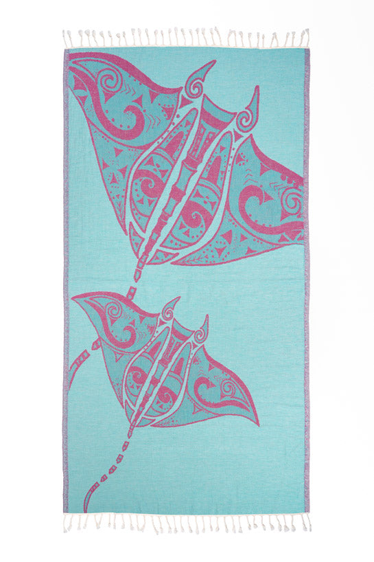 Towel with pink stingray design on a light blue background