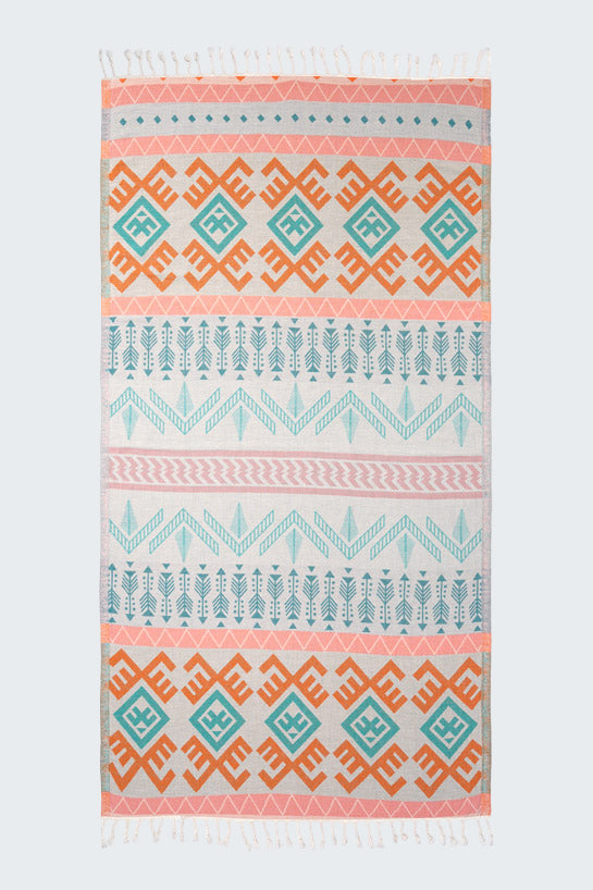 Patterned rug with geometric design on a white background