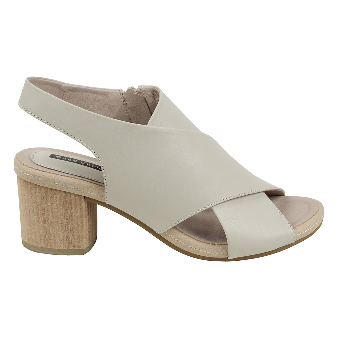Beige sandal with wooden block heel on a white background