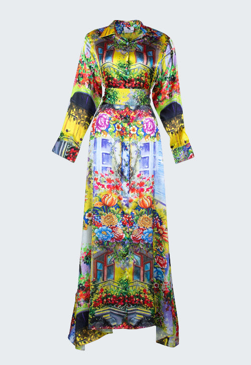 Colorful dress with floral and architectural print on a white background