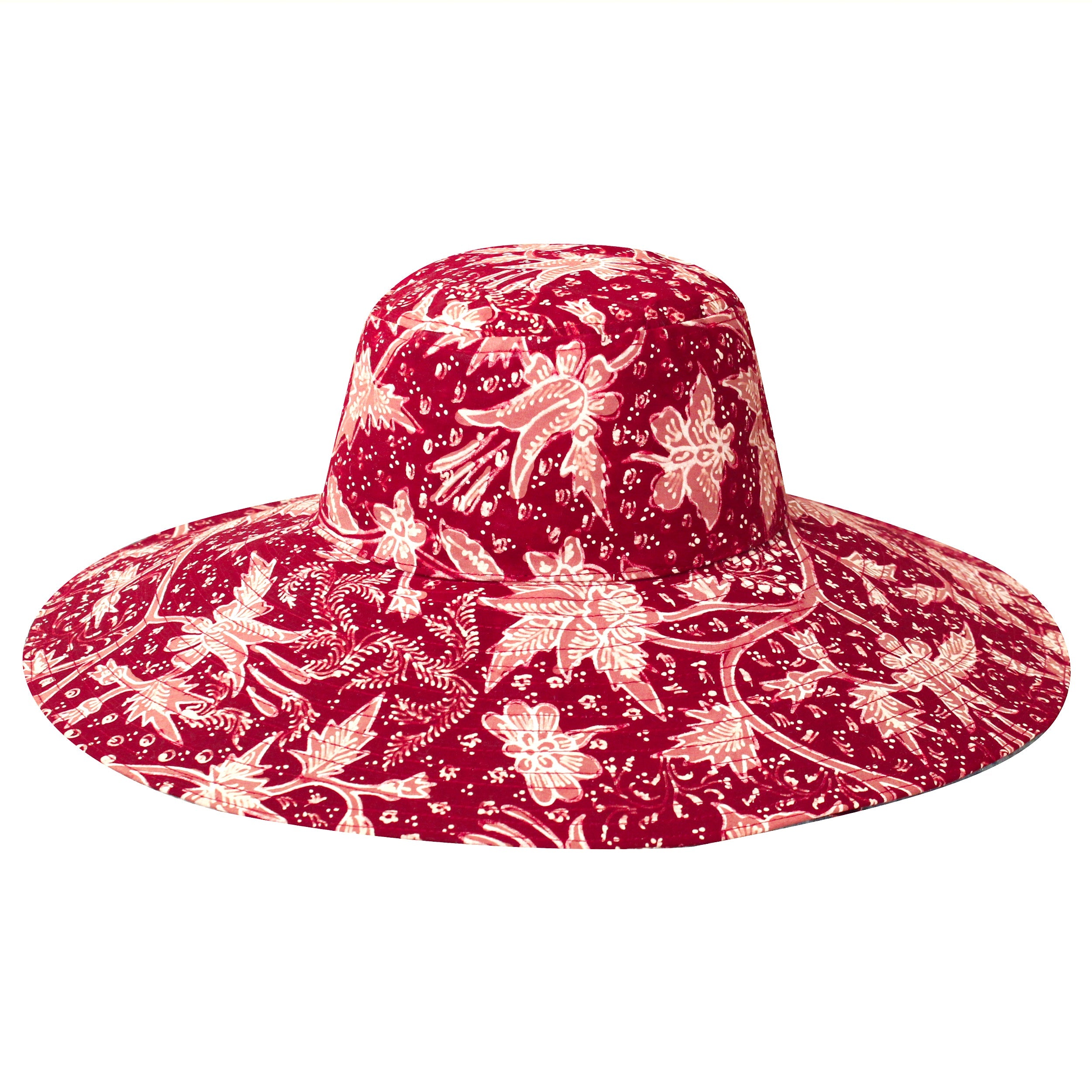 Red floral patterned sun hat on a white background