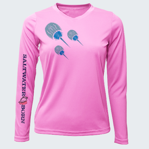 Pink long-sleeve shirt with 'Saltwater Born' branding and paddle graphic on a white background