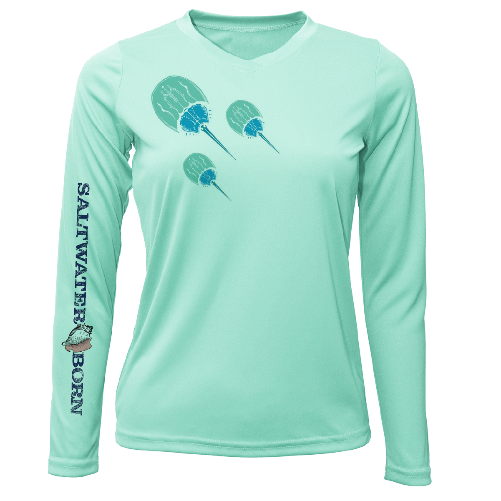 Mint green long-sleeve shirt with paddle graphic and 'Saltwater Born' text on a white background
