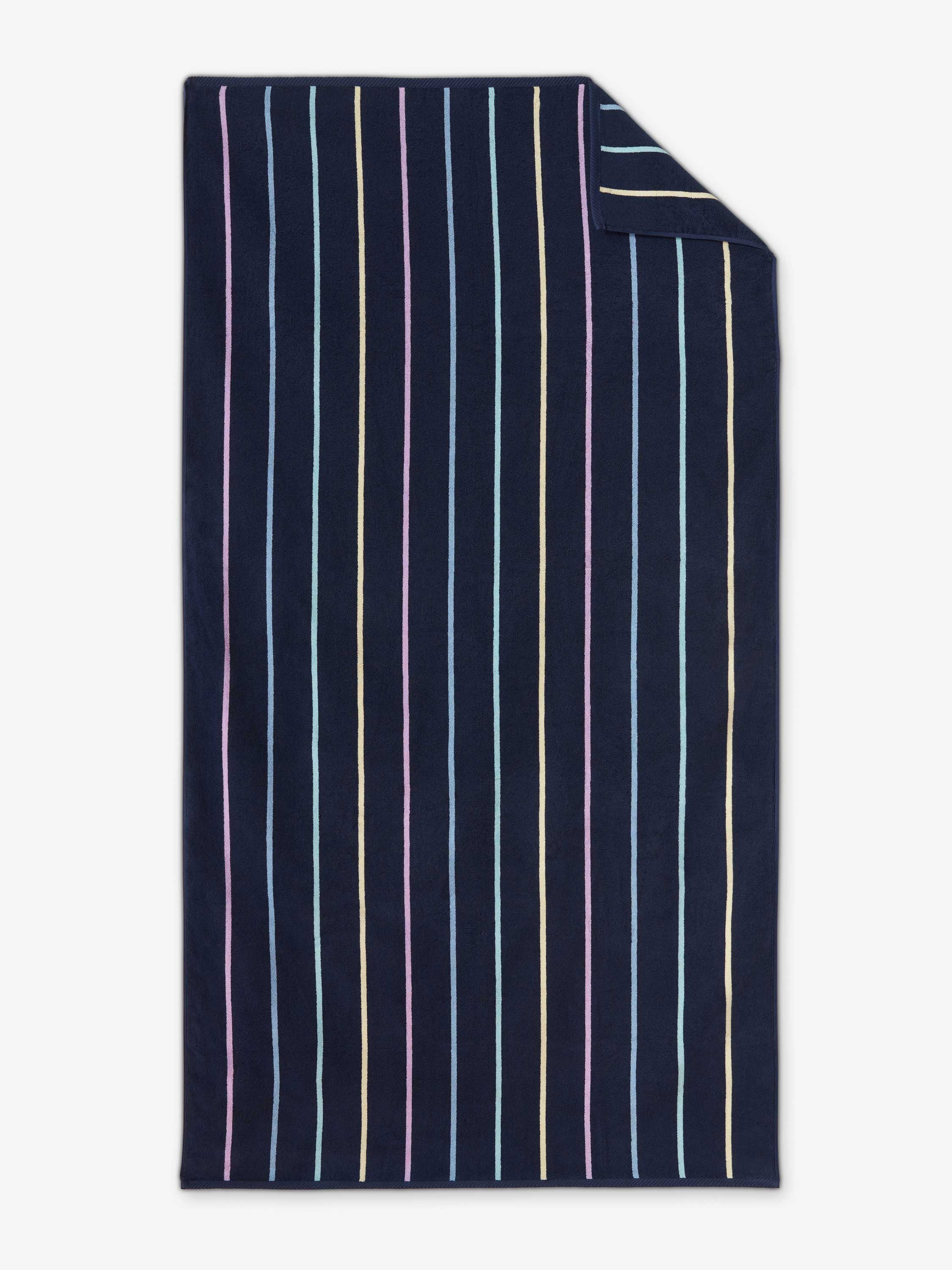 Navy blanket with thin white and gold stripes on a white background