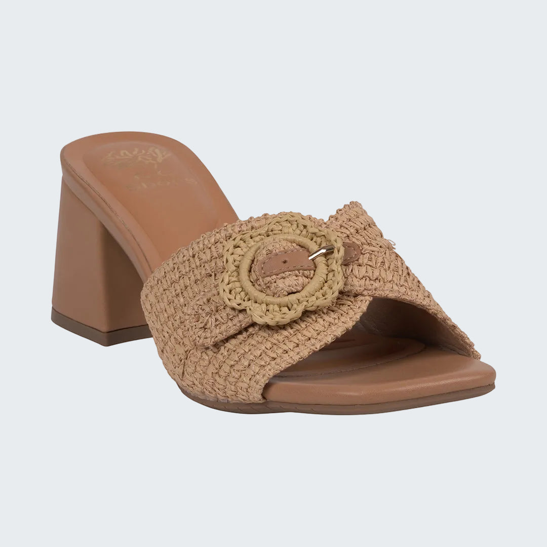 Brown woven sandal with a decorative ring on a white background