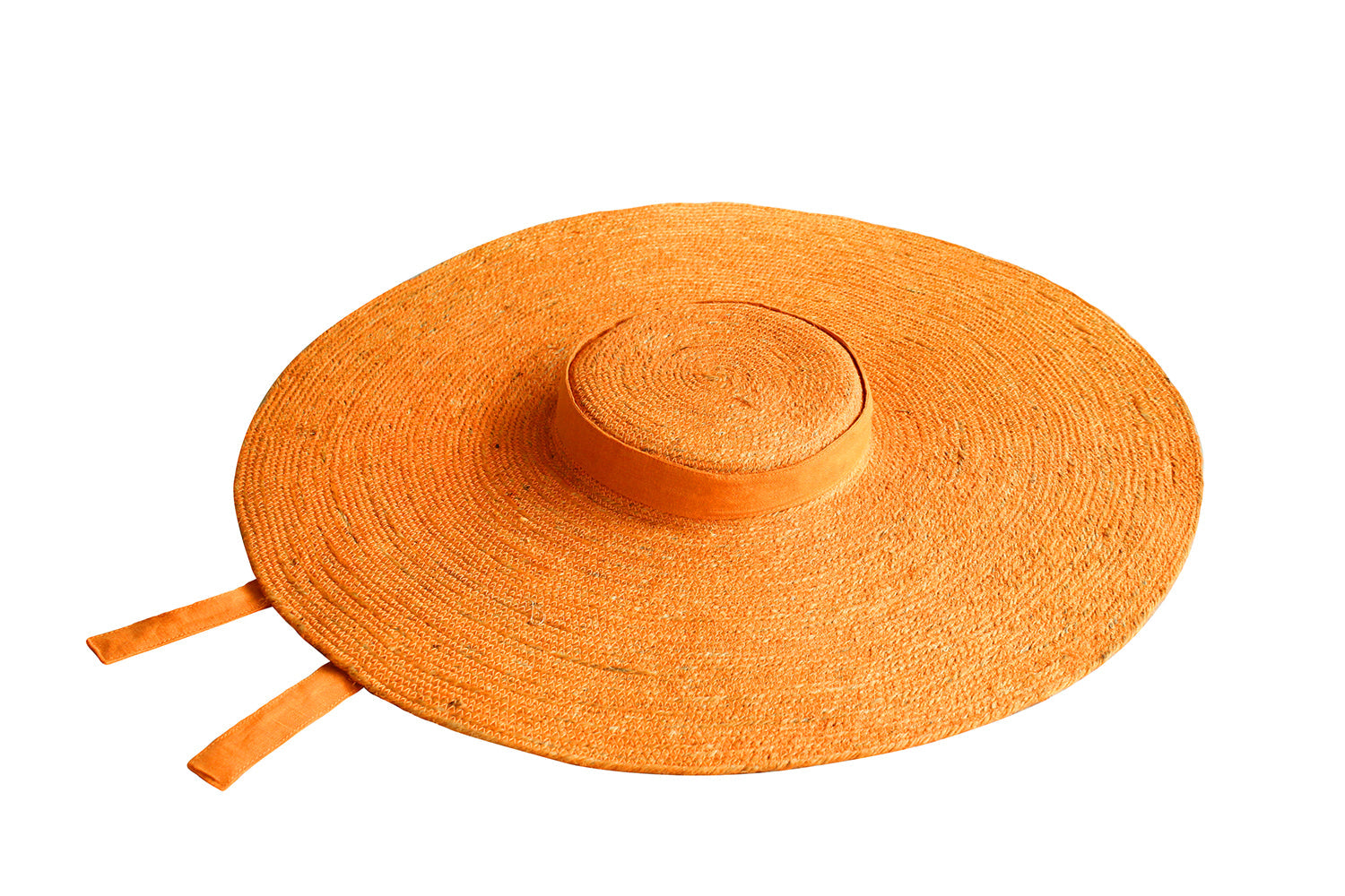 Orange straw hat with a wide brim on a white background