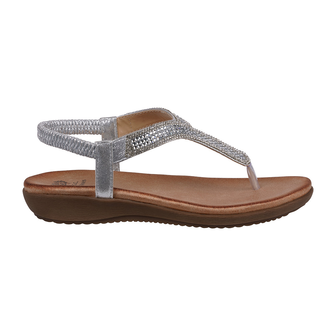 Brown sandal with a decorative silver strap on a white background