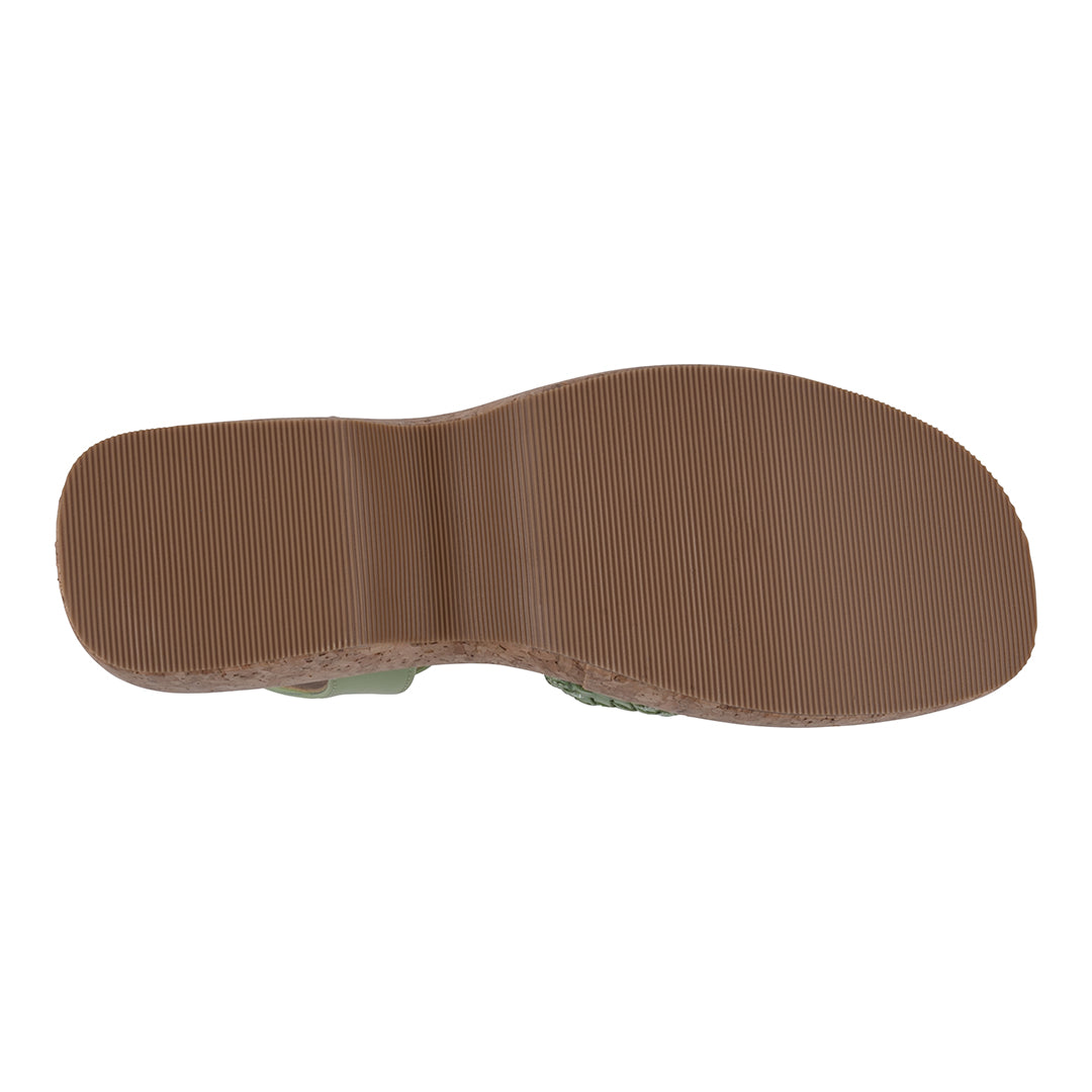 Brown sole of a shoe on a white background