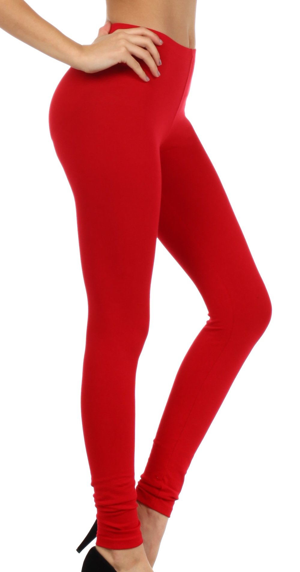 Red leggings worn by a person on a white background
