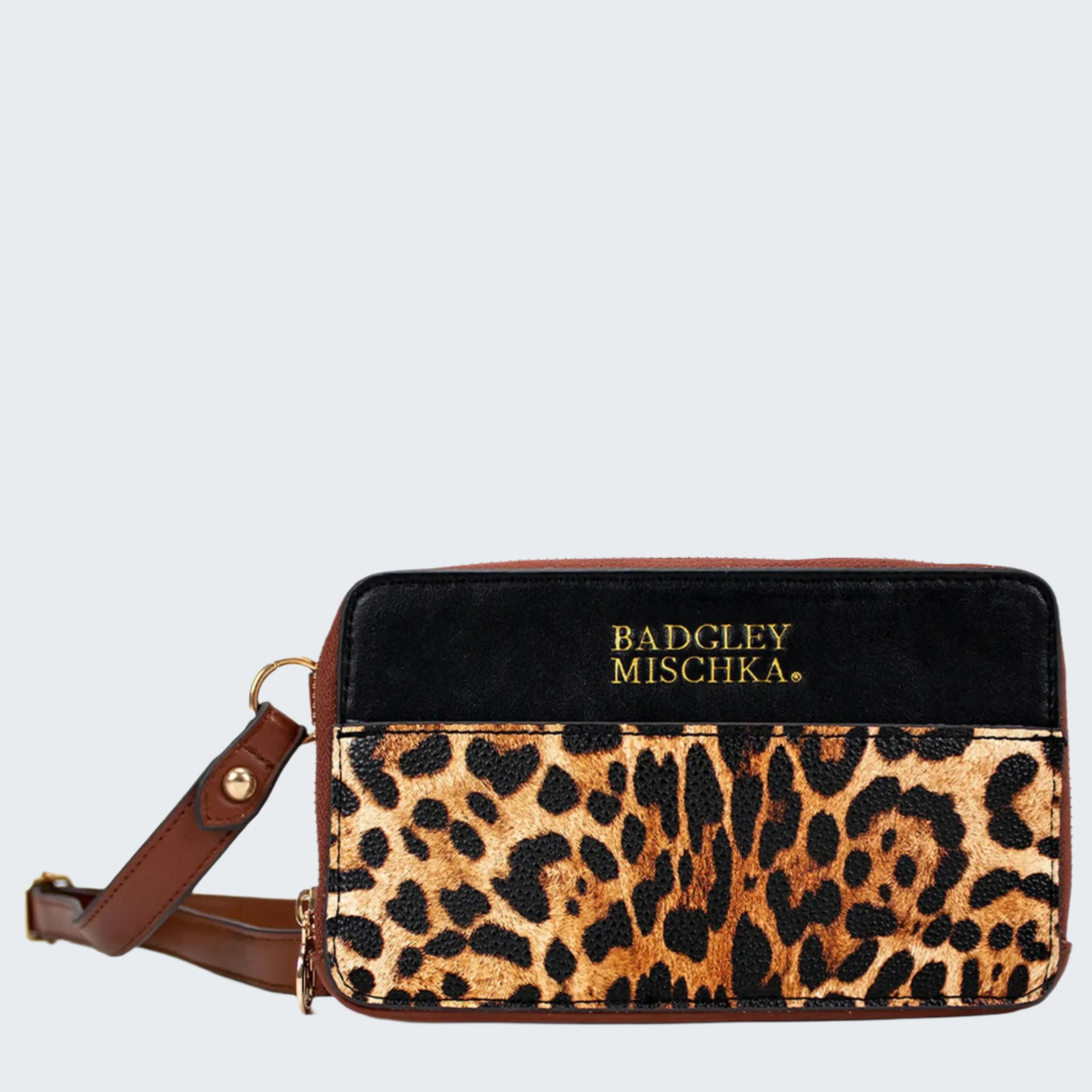 Leopard print handbag with black top section and 'Badgley Mischka' branding on a white background