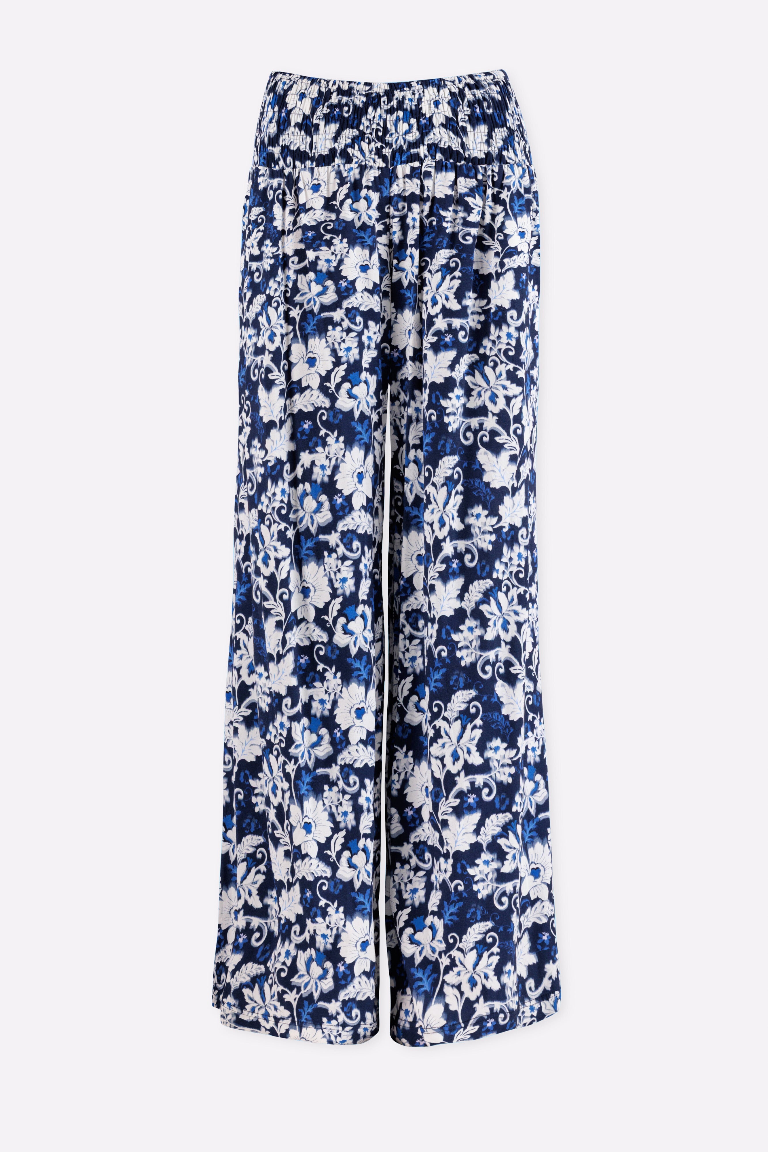 Floral-patterned pants on a white background