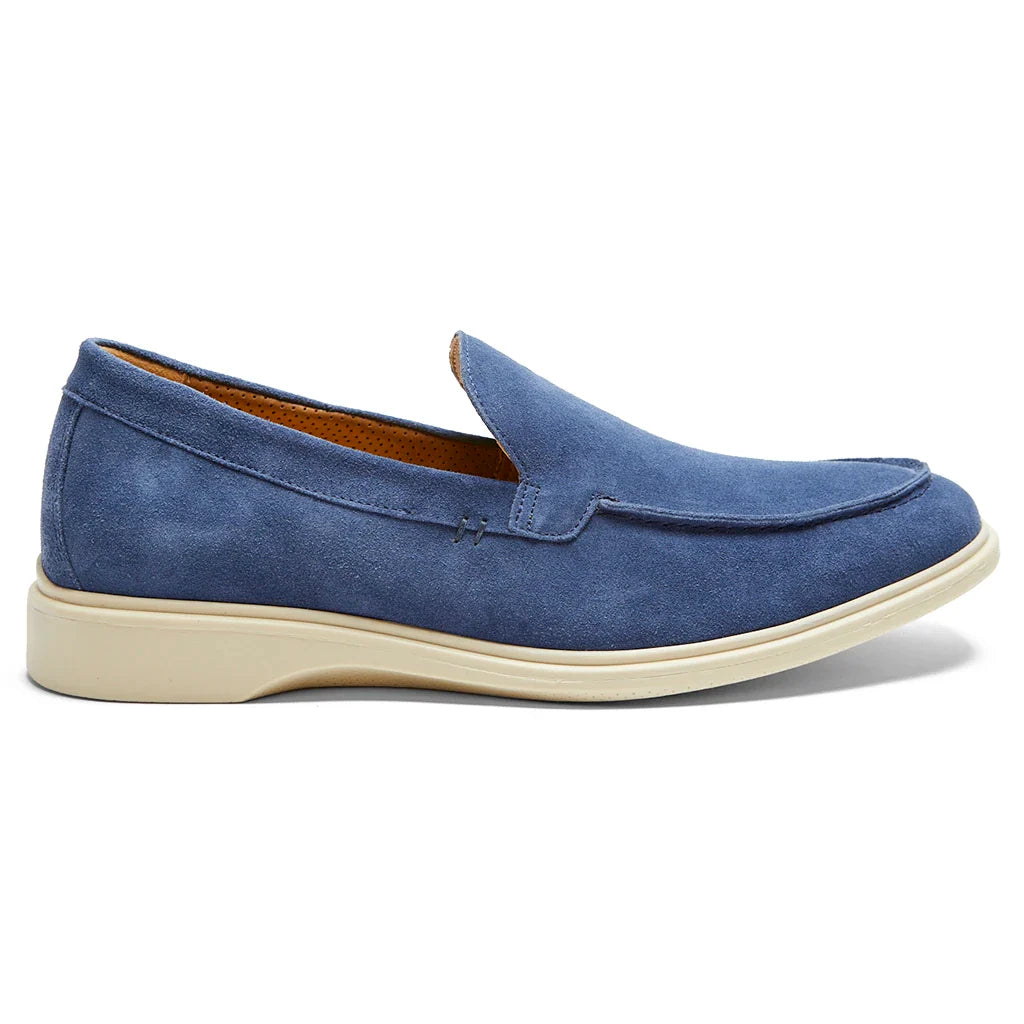 Blue loafer shoe on a white background