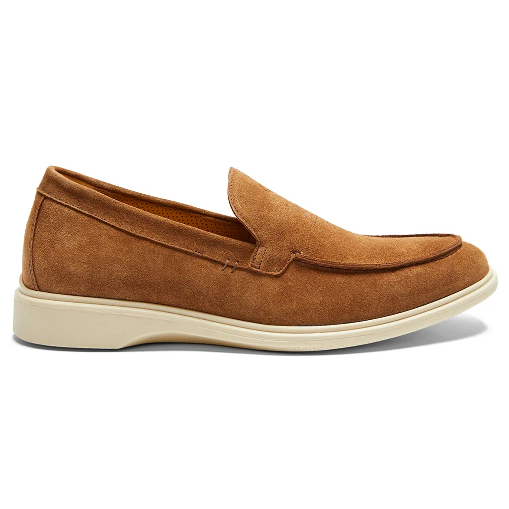 Brown suede loafer shoe on a white background