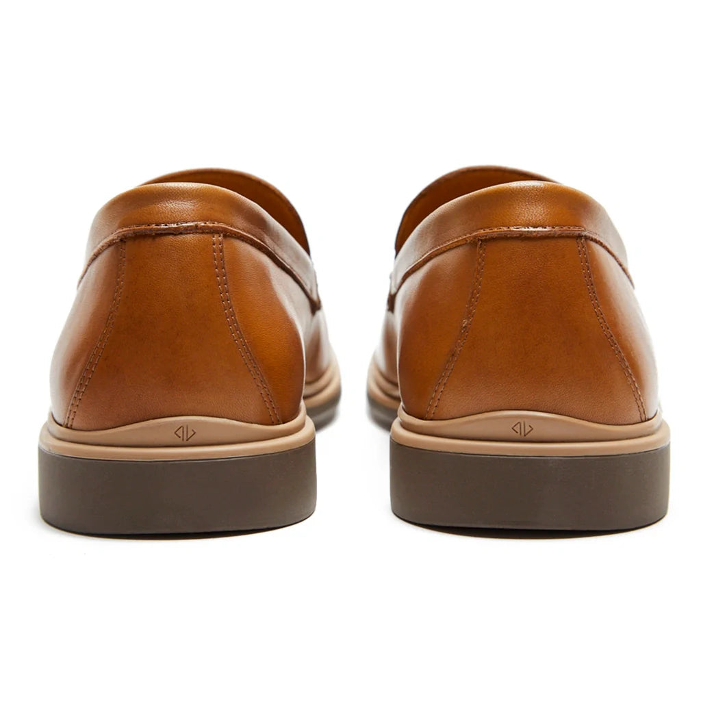 Pair of brown leather shoes on a white background