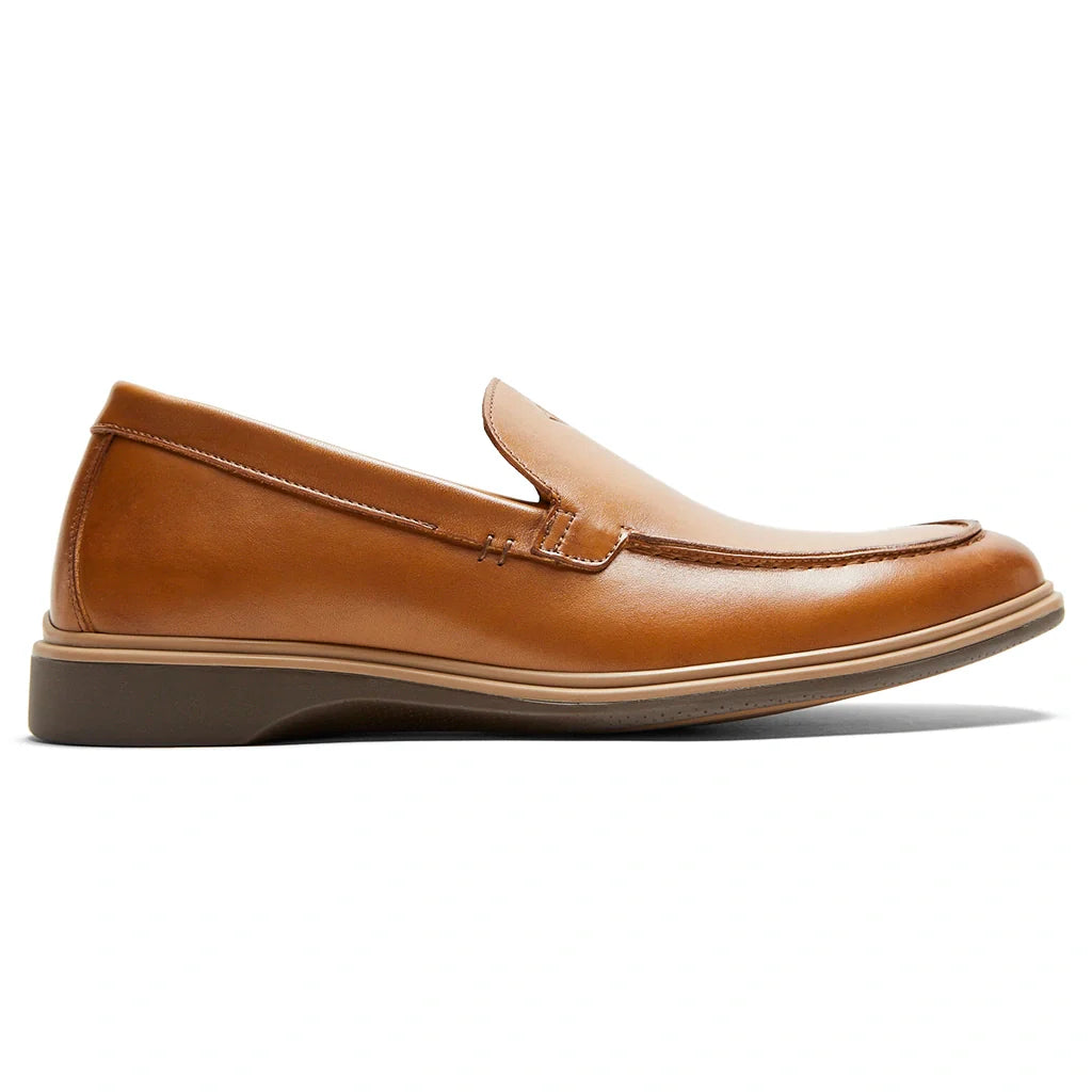 Brown leather loafer shoe on a white background