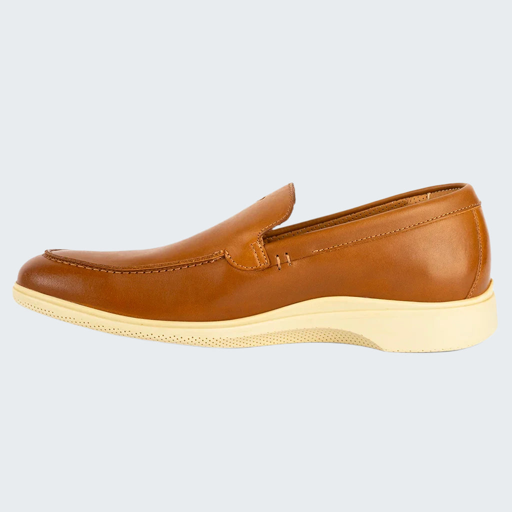 Brown loafer shoe on a white background