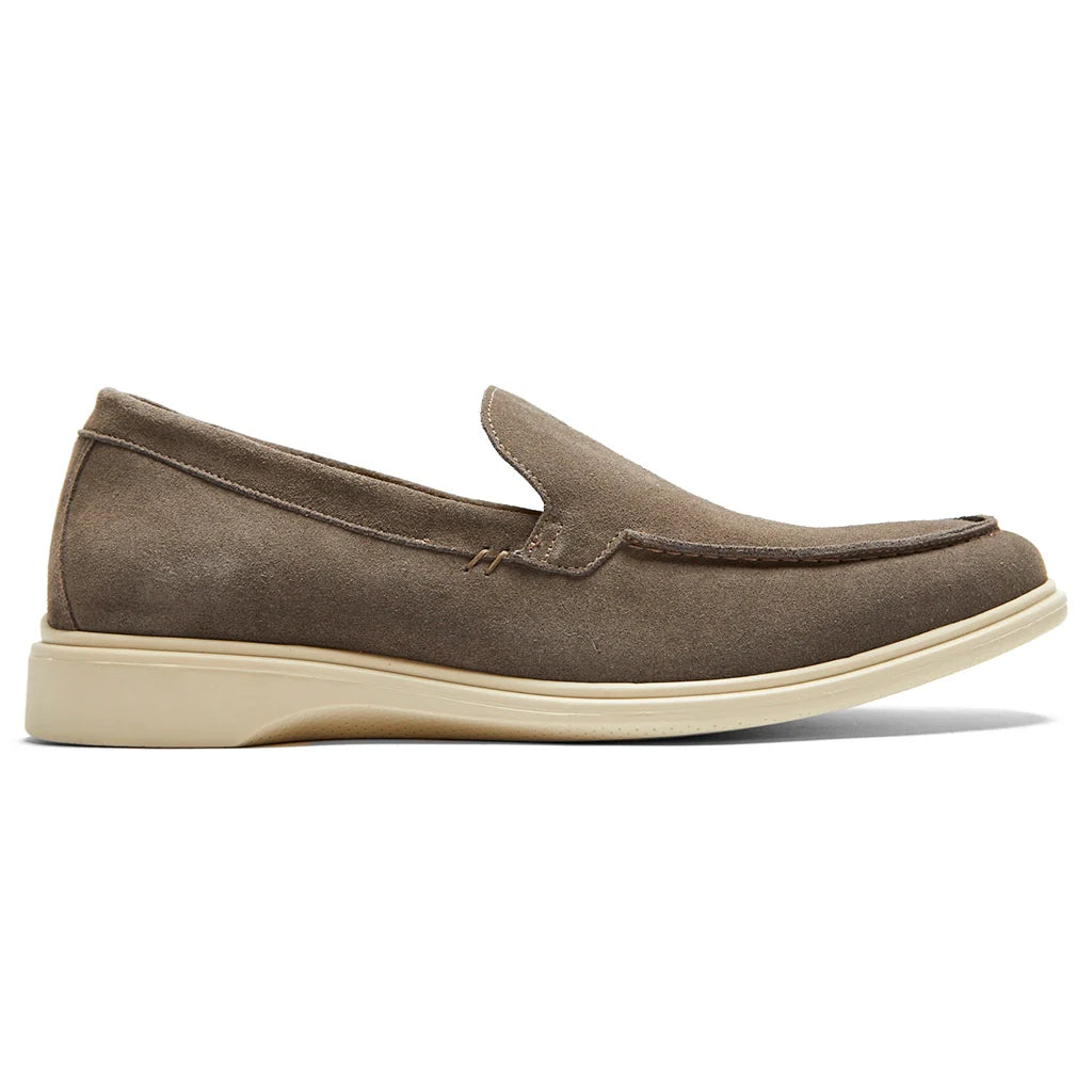 Brown loafer shoe on a white background