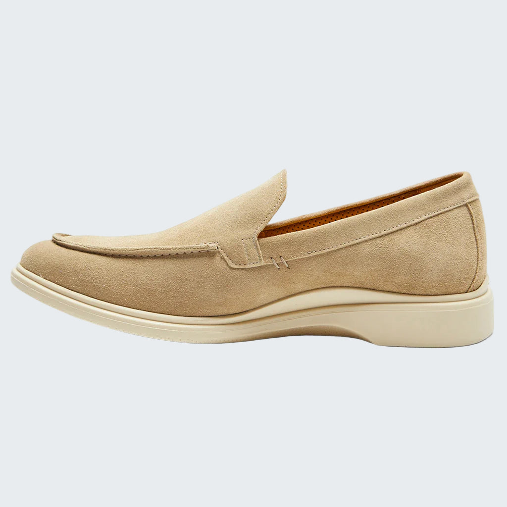 Beige loafer shoe on a white background