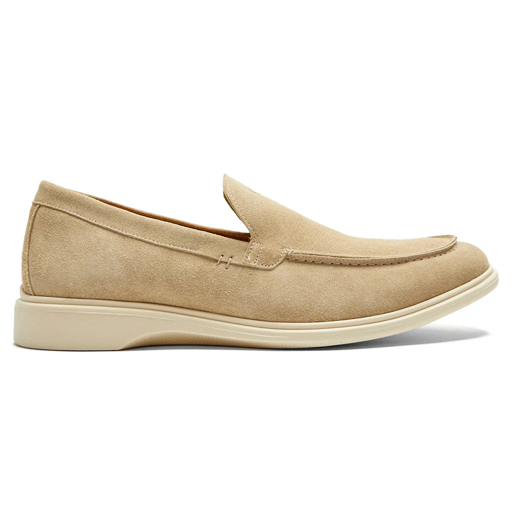 Beige loafer shoe on a white background