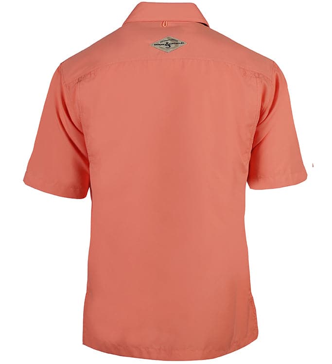 Coral polo shirt on a white background