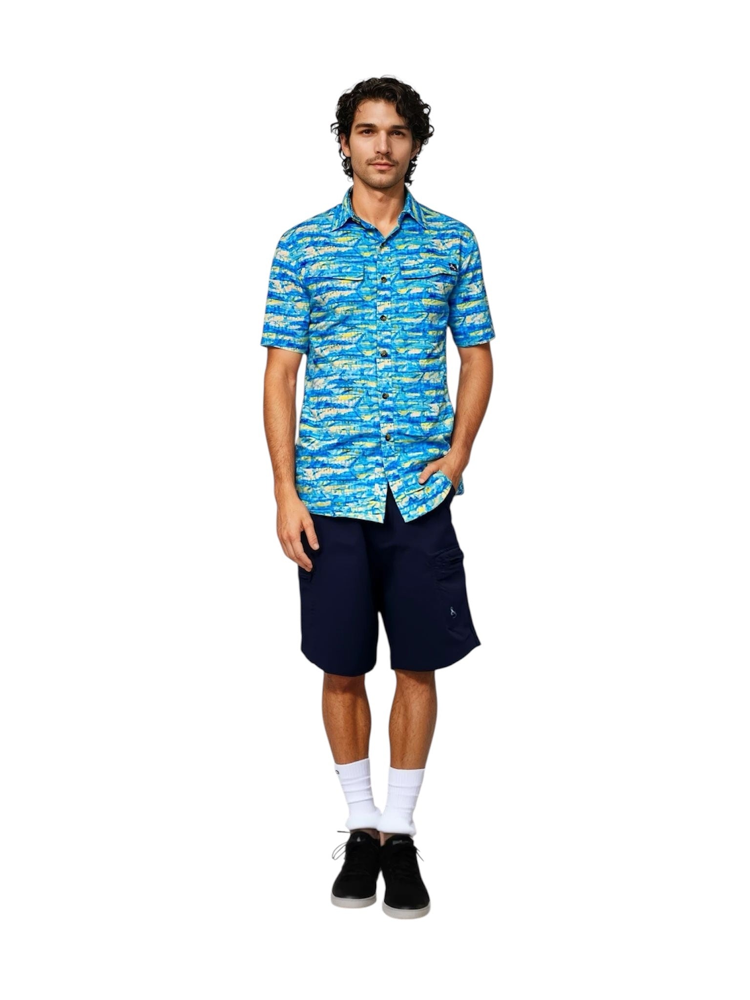 Man wearing a blue patterned shirt and navy shorts on a white background