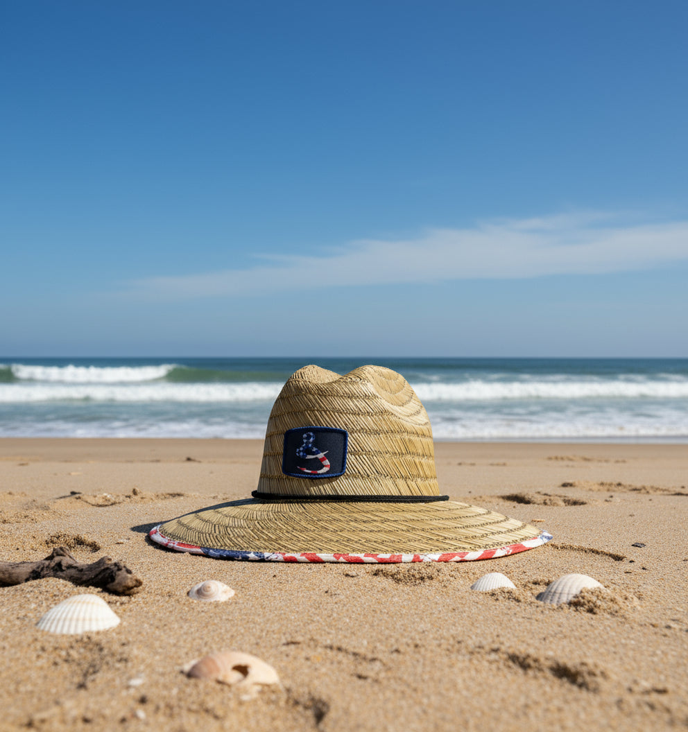 Straw hat with a blue patch on a white background