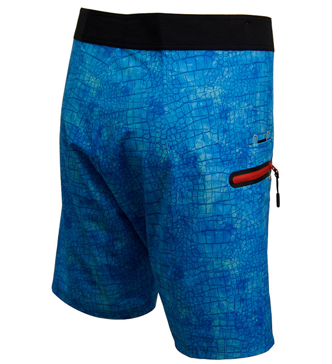 Blue patterned shorts with a red zipper pocket on a white background