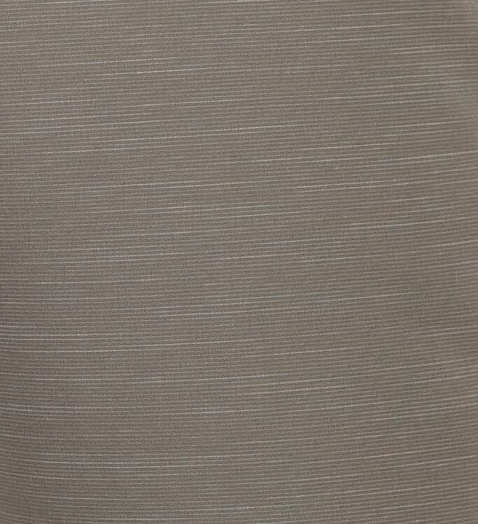 Close-up of a textured brown fabric surface