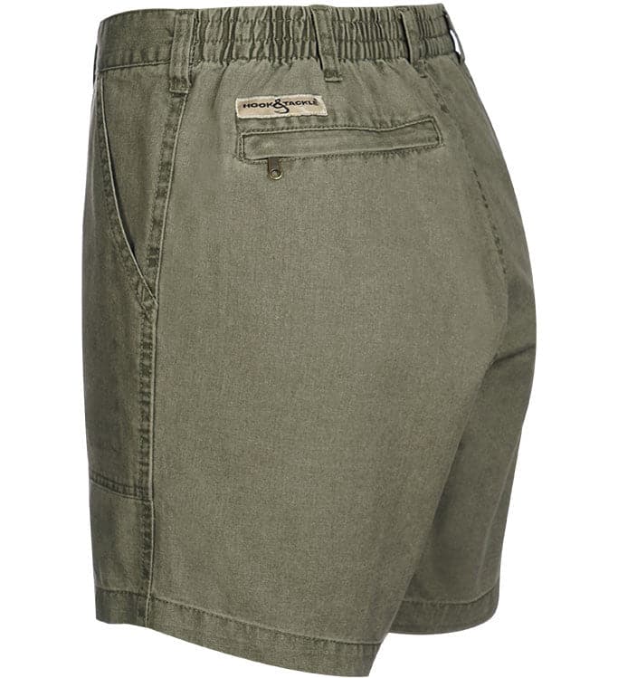 Green shorts with a brand label on a white background