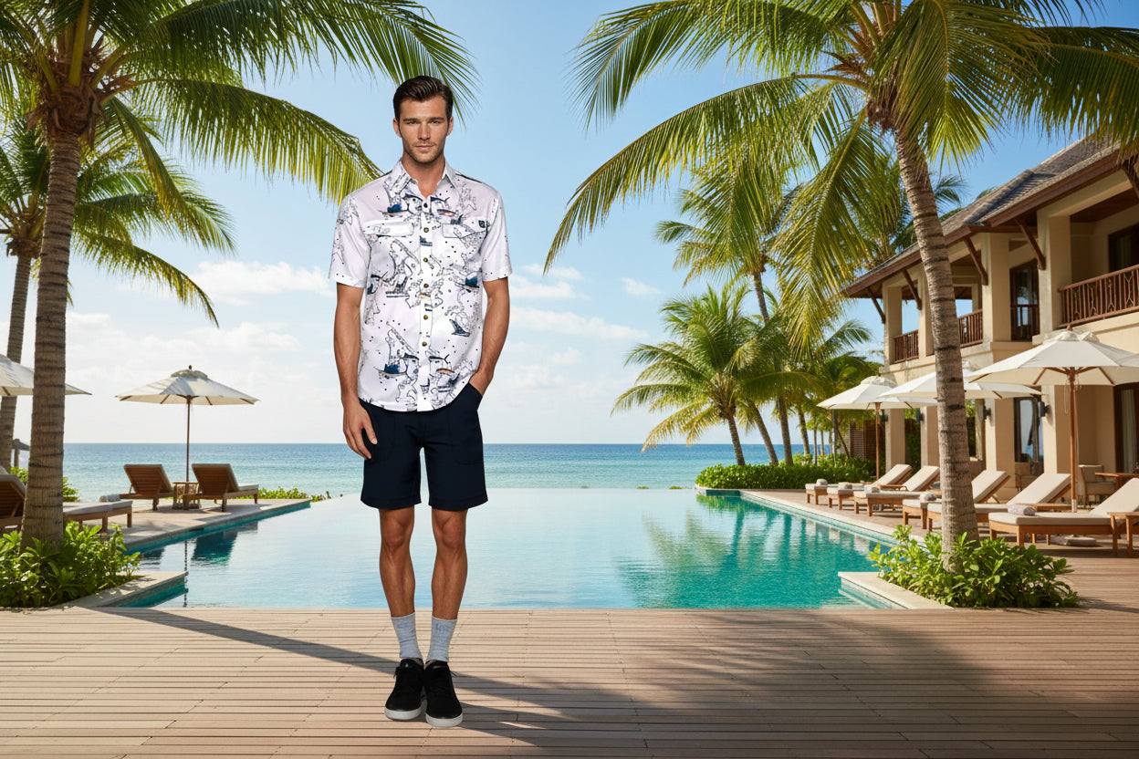 Man wearing a white patterned shirt and black shorts on a white background